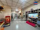 Living room with television and shelves