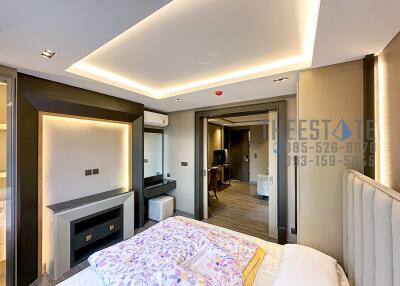 Modern bedroom with ensuite and contemporary lighting