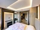 Modern bedroom with ensuite and contemporary lighting