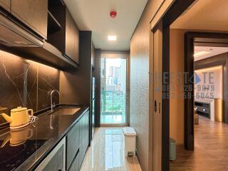 Modern kitchen with view of city from balcony