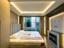 Modern bedroom with large windows and built-in lighting