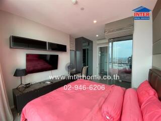 Modern bedroom with a large window and a view