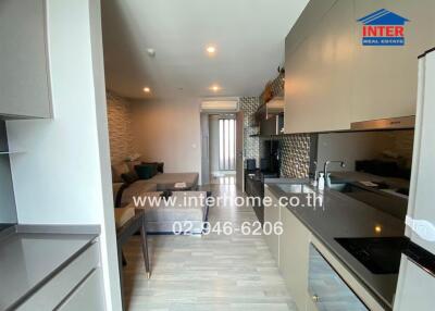 Modern kitchen with adjoining living area