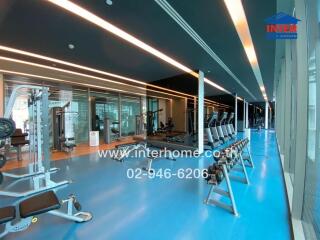 Modern indoor gym with multiple exercise equipment