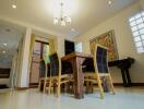 Spacious dining area with a wooden table and modern chairs