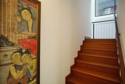 Decorated staircase with wall art