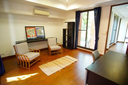 Living room with wooden floors and modern furniture