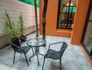 Outdoor patio with table and two chairs