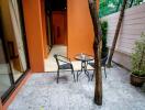 Cozy outdoor patio with table and chairs