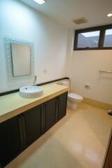 Modern bathroom with vanity sink and toilet