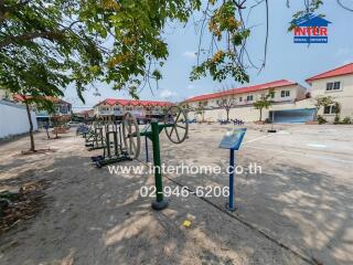 Outdoor fitness area in a residential community with exercise equipment