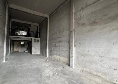 Empty industrial space with concrete walls and floors