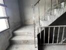 Concrete stairwell with metal railing