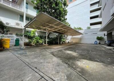 Covered parking area in a residential complex