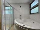 Bathroom with bathtub and shower area