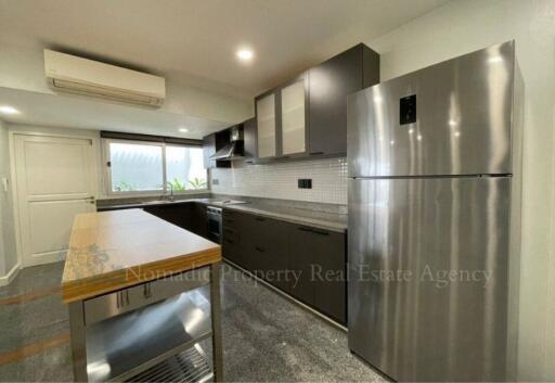 Modern kitchen with stainless steel appliances