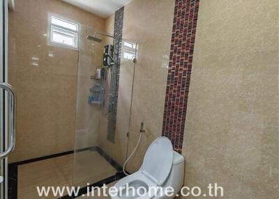 Modern bathroom with shower and toilet