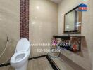 Modern bathroom with tiled walls and a sleek vanity area