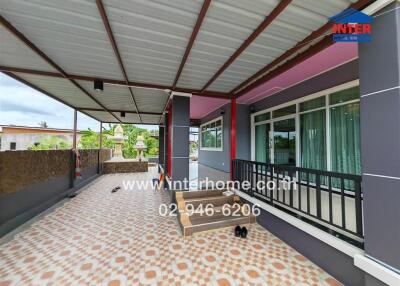 Covered outdoor area with tiled flooring