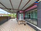 Covered outdoor area with tiled flooring