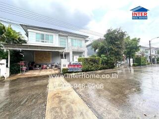 Exterior view of a house with driveway and garage