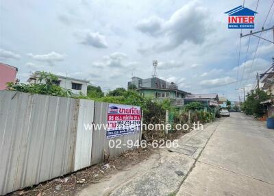 Street view of residential area with properties for sale