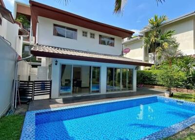 Backyard with pool and house view