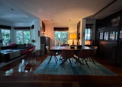 spacious combined dining and living area with natural light