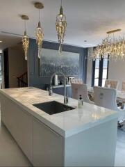 Modern kitchen with island and dining area