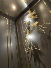 Decorative lighting fixture in a modern hallway