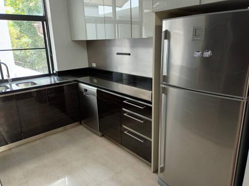 Modern kitchen with stainless steel appliances and sleek cabinetry