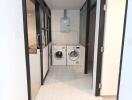 Modern laundry room with washing machine and dryer