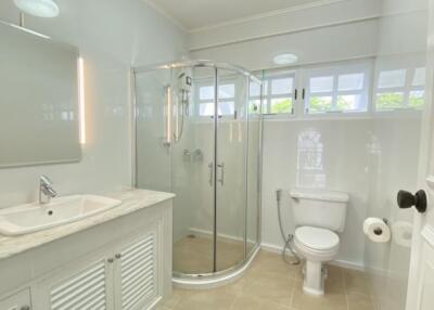 Modern bathroom with glass shower and vanity