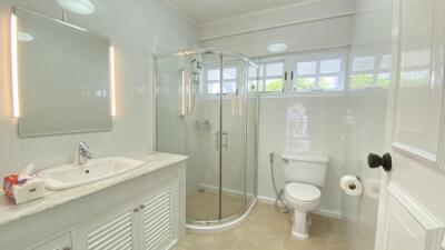 Modern bathroom with glass shower and vanity