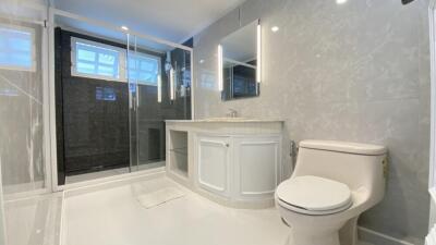 Modern bathroom with glass shower and vanity