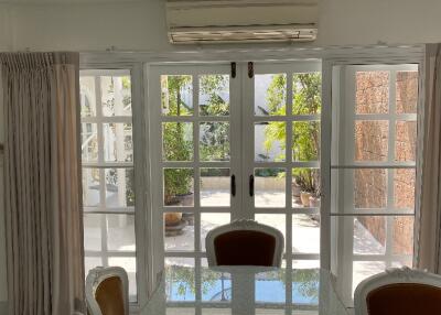 French doors opening to a patio.