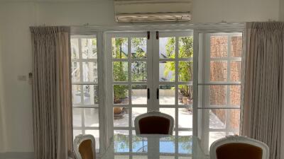 French doors opening to a patio.