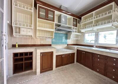 Spacious kitchen with ample storage and countertop space