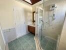 Modern bathroom with glass shower and vanity