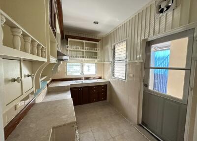 Modern kitchen with ample storage and natural light