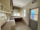 Modern kitchen with ample storage and natural light