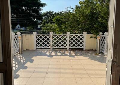 Spacious balcony with a view of greenery