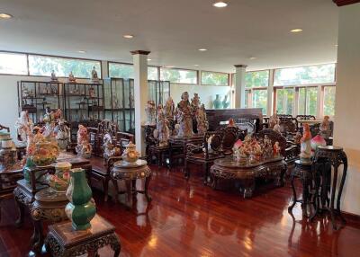 Spacious living room filled with decorative artifacts