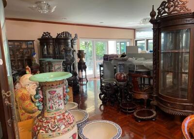 Living room with antique furniture and decor