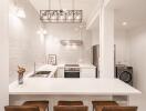 Modern kitchen with island counter and bar stools