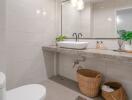 Modern bathroom with large mirror and vanity