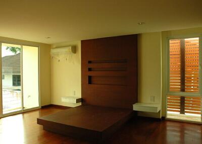 Main living area with wooden floor and built-in features