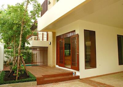 Exterior view of a modern house with a patio