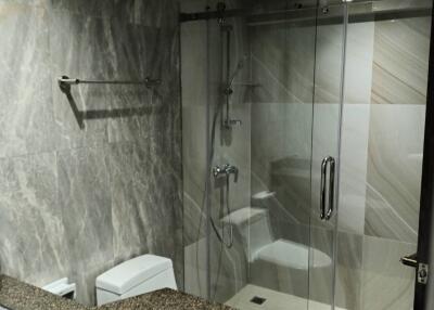 Modern bathroom with glass shower enclosure