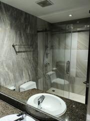 Modern bathroom with glass shower enclosure